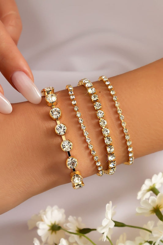 Set of four gold-tone rhinestone bracelets